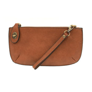 Our most popular bag, this mini clutch, with its sleek silhouette, is as gorgeous as it is versatile.&nbsp; Features include a polished turn lock, six card slots, and an interior zipper for change.&nbsp; It can be styled in many ways, with removable straps to alternate between wallet, crossbody, and wristlet!  &nbsp;5"H x 9.5"W x 1"D