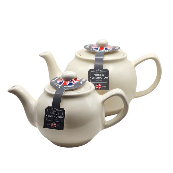 When it's time for a spot of tea, reach for one of our stoneware teapots, which can absorb the heat of boiling water without cracking. Likewise, the beautiful exterior is protected with a gloss to prevent the paint from warping or rippling. The classic bulbous shape allows tea leaves or bags to move freely for just the right amount of flavoring. 

The matte cream teapot is available in 2-cup or 6-cup size