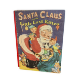 Bring a little nostalgia to your holiday decor this year with this vintage book cover of "Santa Claus and the Little Lost Kitten." This adorable box opens up for storage for some of your favorite treasures.

&nbsp;9" H x 7" W x 2" D