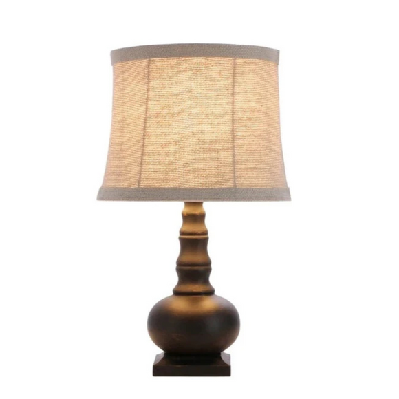 This striking accent lamp features a slightly weathered black finish. A classic look for any room in the house. This little lamp adds the perfect touch to a powder room bedroom, living room, bookcase, or small accent table. Use it as a night light or accent light. 

25-watt bulb not included.

15