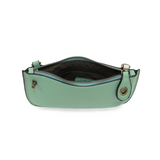 Our most popular bag, in a beautiful hint of mint, this mini clutch, with its sleek silhouette, is as gorgeous as it is versatile.&nbsp; Features include a polished turn lock, six card slots, and an interior zipper for change.&nbsp; It can be styled in many ways, with removable straps for alternating between wallet, crossbody, and wristlet!

&nbsp;5"H x 9.5"W x 1"D

Removable and adjustable crossbody strap 13"-24"

Wristlet strap 7" long

interior zippered pocket

brass plated hardware

100% vegan leather (