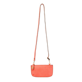 Our most popular bag, in a beautiful watermelon color, this mini clutch, with its sleek silhouette, is as gorgeous as it is versatile.&nbsp; Features include a polished turn lock, six card slots, and an interior zipper for change.&nbsp; It can be styled in many ways, with removable straps for alternating between wallet, crossbody, and wristlet!

&nbsp;5"H x 9.5"W x 1"D

Removable and adjustable crossbody strap 13"-24"

Wristlet strap 7" long

interior zippered pocket

brass plated hardware

100% vegan leath