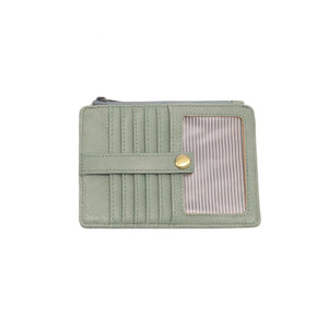 We love this mini wallet in a dusty sage vegan leather! It is full of style and will hold your license and up to six credit cards. The zipper pocket is roomy enough for your change and cash, and a pocket is on the back.&nbsp; This mini wallet is perfect for you, but it makes an awesome gift!

DIMENSIONS: 4 IN. H X 5.5 IN. W X .25 IN. D

ZIPPERED TOP CLOSURE ON EDGE

6 CREDIT CARD POCKETS

ID WINDOW POCKET

EXTERIOR PASSPORT POCKET

STRIPED LINING

BRASS PLATED HARDWARE

100% VEGAN LEATHER (POLYURETHANE)