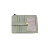 We love this mini wallet in a dusty sage vegan leather! It is full of style and will hold your license and up to six credit cards. The zipper pocket is roomy enough for your change and cash, and a pocket is on the back.&nbsp; This mini wallet is perfect for you, but it makes an awesome gift!

DIMENSIONS: 4 IN. H X 5.5 IN. W X .25 IN. D

ZIPPERED TOP CLOSURE ON EDGE

6 CREDIT CARD POCKETS

ID WINDOW POCKET

EXTERIOR PASSPORT POCKET

STRIPED LINING

BRASS PLATED HARDWARE

100% VEGAN LEATHER (POLYURETHANE)