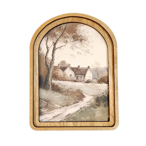 This gorgeous arched artwork has a scene of a lane leading to a country cottage. A large tree frames the cottage entrance on the left, and is done in soft greens and browns.

This unique artwork is printed onto canvas using high quality Canon pigment inks. The canvas is then mounted onto a wood backer. This piece has a double layered wood frame stained in a neutral Early American tone. This piece can be hung on a wall using an adhesive strip or it can sit on a shelf.

8