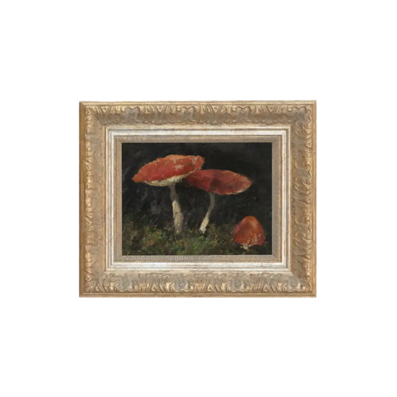 Three red mushrooms are the star on this moody canvas! It has a larger carved gold/silver frame that adds a classic charm.  Comes with a paper backing and hanging hardware for easy installation.

Made in the USA: Proudly crafted with quality and care. 

Care Instructions: Keep canvas dry to maintain its quality. If smudged or dirty, gently wipe with a dry, soft cloth.