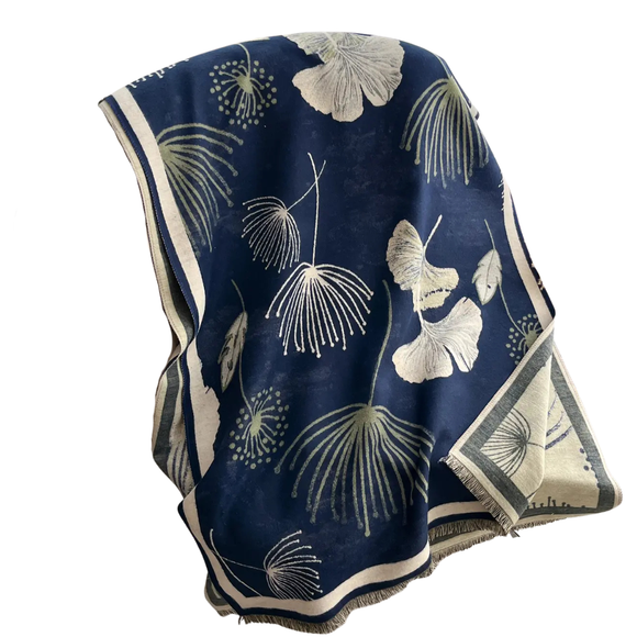 This one size fits all reversible wrap, drapes over and accents any outfit, casual or dressy. It feels and looks like cashmere. A beautiful layering piece!

55% Poly, 45% Viscose.

Dry clean or hand wash cold with light colors, lay flat to dry, iron on lowest setting if need, do not bleach.