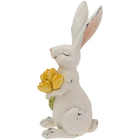 This spring, you need this whimsical little guy! Noms the bunny is clutching a bouquet of yellow tulips. This rustic resin bunny with hand-painted details, is sure to bring a smile to your decor!

4.5