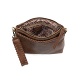 This sleek top zip clutch crafted in a saddle colored buffalo grain vegan leather is accented with whipstitching to give it a modern western style. It looks great with jeans or a dress and easily goes from day to night as the Oakley can be carried as a clutch, a wristlet or a crossbody bag with the included detachable wristlet strap with whipstitched details, an adjustable and removable shoulder strap.


Dimensions: 7 in. H x 10 in. W x 3 in. D
Top zip closureWristlet strap with whipstitching: 8 in. long
Ad