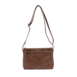 This sleek top zip clutch crafted in a saddle colored buffalo grain vegan leather is accented with whipstitching to give it a modern western style. It looks great with jeans or a dress and easily goes from day to night as the Oakley can be carried as a clutch, a wristlet or a crossbody bag with the included detachable wristlet strap with whipstitched details, an adjustable and removable shoulder strap.


Dimensions: 7 in. H x 10 in. W x 3 in. D
Top zip closureWristlet strap with whipstitching: 8 in. long
Ad