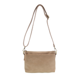 This sleek top zip clutch crafted in a buff colored buffalo grain vegan leather is accented with whipstitching to give it a modern western style. It looks great with jeans or a dress and easily goes from day to night as the Oakley can be carried as a clutch, a wristlet or a crossbody bag with the included detachable wristlet strap with whipstitched details, an adjustable and removable shoulder strap.


Dimensions: 7 in. H x 10 in. W x 3 in. D
Top zip closureWristlet strap with whipstitching: 8 in. long
Adju