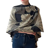 Cozy Cashmere Like Travel Wrap This one size fits all reversible loop wrap, drapes over and through shoulder loop to stay in place. Accents any outfit, casual or dressy. It feels and looks like cashmere. A beautiful layering piece!

60% Poly, 40% Acrylic.

Dry clean or hand wash cold with light colors, lay flat to dry, iron on lowest setting if need, do not bleach.