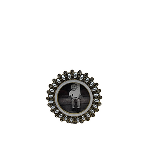 This adorable mini round frame is made with faux pearls and Austrian crystals all around the border of each frame. A vintage but elegant chic style to add to any vanity or dresser.

2 1/2" Dia