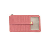 This slim and sleek wallet has nine credit card pockets, each with a snap tab for security and brass-plated hardware. It also has an ID window, zippered change pocket, and zippered billfold pocket in distressed pink punch vegan leather.


DIMENSIONS: 3.75 IN. H X 7.25 IN. W X .25 IN. D&nbsp;


100% Vegan leather (polyurethane)