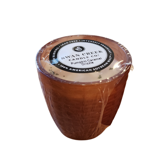 You'll love our cathedral small vase candle. This pumpkin caramel drizzle candle has been poured into a pretty basketweave frosted brown glass.

It's Pumpkin Time!  This candle will smell like you are baking all sorts of pumpkin treats when you burn it!

Filled with 4.5 oz. of American Soybean WaxTM. Measures 3