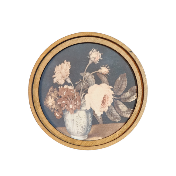 A romantic piece, this picture of flowers in golds, pinks & persimmon in a vase will be the perfect accessory for your bookcase or wall! It is printed onto canvas using high quality Canon pigment inks. The canvas is then mounted onto a wood backer. This piece has a double layered wood frame stained in a neutral Early American tone. This piece can be hung on a wall using an adhesive strip or it can sit on a shelf.

8
