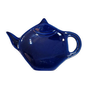 Get one of our cute retro-inspired teapot-shaped tea bag holders to help keep the drips from your teabags from going anywhere!

Royal Blue, single glaze lead-free ceramic ware.

Approximately 5" w x 3.25" h