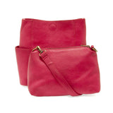 Casual and carefree crossbody in super soft pebble grain vegan leather! Our Kayleigh bucket bag in a beautiful ruby pink&nbsp;comes with a smaller bag that can be carried inside or used alone! The convenient side pockets of this bucket bag can carry your water bottle, phone or glasses.&nbsp;


11" W X 11.25" H X 3.5"
Magnetic Snap Closure
2 open and 1 zipper interior pockets
2 exterior open pockets and 1 back zipper pocket
12- 18" adjustable drop and detachable crossbody strap with lobster claw clasps
Brush
