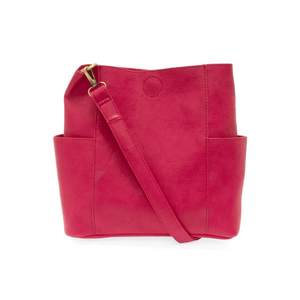 Casual and carefree crossbody in super soft pebble grain vegan leather! Our Kayleigh bucket bag in a beautiful ruby pink&nbsp;comes with a smaller bag that can be carried inside or used alone! The convenient side pockets of this bucket bag can carry your water bottle, phone or glasses.&nbsp;


11" W X 11.25" H X 3.5"
Magnetic Snap Closure
2 open and 1 zipper interior pockets
2 exterior open pockets and 1 back zipper pocket
12- 18" adjustable drop and detachable crossbody strap with lobster claw clasps
Brush
