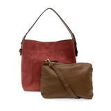 Equally timeless and modern, our best-selling classic hobo is made in rich vegan leather in a beautiful rust faux suede, accented with a brown strap.&nbsp; This roomy bag, accented with a large front pocket and a snap-in removable brown crossbody, has plenty of room to carry your needs in style.