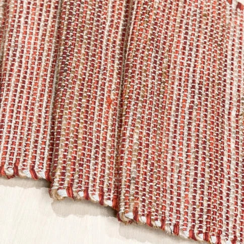 Need to add a little texture to your home? You'll love this incredibly stylish, sustainable, and durable hand-woven khaki and rust and orange-colored table runner. It will surely enrich the décor of any surface in your home. Made with Jute and cotton, these runners are environmentally friendly, sustainable, trendy, and stylish.  13