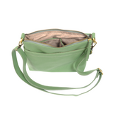 Your perfect goes with anything bag! In just the right size to carry your essentials, this seafoam pebbled vegan leather bag has multiple pockets and a top zip closure for security, so you are ready for anything your day brings. Add one of our interchangeable Guitar Straps to add your own style!


Product Details
Dimensions: 11 in. W x 11.25 in. H x 3.5 in. D
Magnetic Snap Closure
2 Open and 1 Zipper Interior Pockets
2 Exterior Open Pockets and 1 Back Zipper Pocket
12x18 in. Drop Adjustable and Detachable C