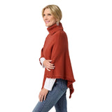 The epitome of cozy, this everyday luxury poncho is crafted from a soft knit fabric in spice, with a rich cable texture that adds depth and dimension. Designed with a relaxed drape and a comfortable turtleneck, it delivers effortless warmth while maintaining an elevated, easy silhouette. The lightweight feel allows for comfortable layering without bulk, making it a versatile piece for both casual and polished styling. Soft. Luxe. and made for all day comfort, this poncho brings refined ease and timeless app