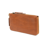 Cool, stylish, and organized, too! This wallet has it all! 12 credit card pockets, 2 change pockets and 2 billfold pockets all wrapped in lush tumbled chicory colored vegan leather, lined with rugged washed canvas, and accented with our new Logo zipper pull. The removable strap lets you carry it as a compact wristlet, too!


Dimensions: 7.75 in. W x 4 in. H x .5 in. D
Full Zip Around Closure
Exterior Zip Pocket on Spine
Removable Wristlet Strap
12 Credit Card Pockets
2 Billfold Pockets
Interior Zipper
Coin 