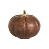 Add warm harvest charm to your seasonal displays with this hand-carved wood pumpkin. Crafted from solid mango wood with rich chestnut and rust tones, this artisan-inspired piece brings inviting texture to any farmhouse, rustic, or cottage-themed space.

7"w x 6.6" h

Material: Mango Wood &amp; Metal

Features: Decorative gold-tone metal stem