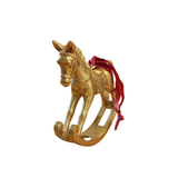 This beautiful gold rocking horse has a berry colored velvet ribbon that it hangs from. Hang it from your tree, or sit it in a beautiful display this holiday season!

approximately 4.5" W x 4" H x&nbsp; 1" D

Metal, Ribbon