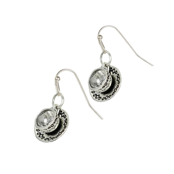 Silver tea cup vintage earrings are a whimsical and charming accessory that transports you to a bygone era. These earrings feature intricately designed silver tea cups, inspired by vintage tea parties and the elegance of yesteryears. Lightweight and comfortable to wear, they effortlessly add a touch of nostalgia to your look. 

Made in China

Measures: 1 1/4 x 1/2