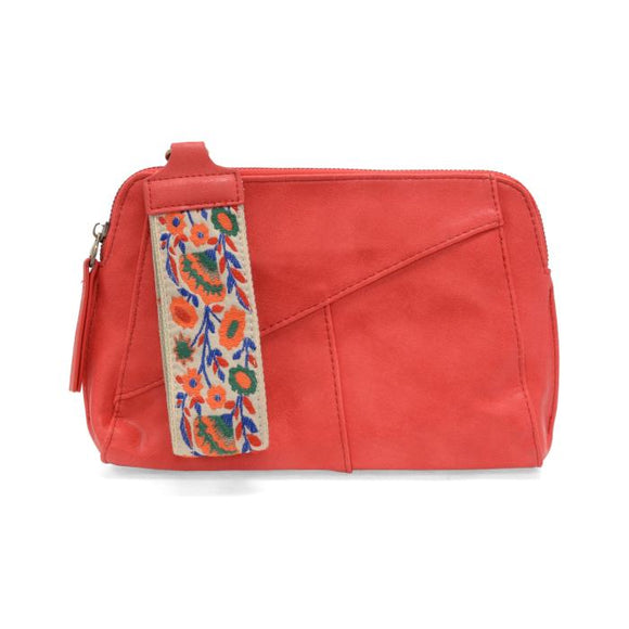 Retro styling crafted in antiqued vegan leather gives this sizzling red clutch a vintage vibe. The removable woven wrist strap is the finishing touch on this stylish bag, so you can wear as a wristlet, a clutch, or even a crossbody with the included removable shoulder strap!





6.75