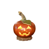 Lucas is our orange colored Jack-O-Lantern with a pumpkin stem.  Comes with a green gourd leaf and electric light.  Approximately 5" in diameter and 6" tall. 

Warning: Gourd are flammable. Do not use candles in them or place near open flames.