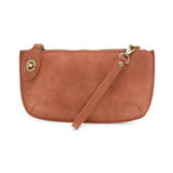 Our bestselling crossbody turn lock clutch has been re-imagined in soft, vegan suede leather in warm, autumnal hues.&nbsp;Sleek and versatile with removable straps, this style can be worn as a Crossbody, carried as a wristlet or a clutch, even doubles as a wallet! With interior credit card slots and enough space to carry your phone, sunglasses, and any other must-haves, all held securely by our locking closure. This casual style is destined to become your new go-to favorite all year long.
Product Details
Di
