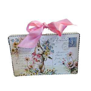 We are in love with this sweet vintage reproduction spring rabbit postcard! Made of MDF, this postcard is surrounded by corrugated silver metal with a silver ring above to attach a pretty spring ribbon or some spring florals. You'll find several places to put this in your home or office and cherish it for years to come!

6.5 H x 8.25 W x 1 D
