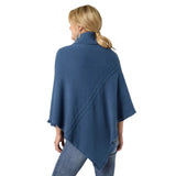 The epitome of cozy, this everyday luxury poncho is crafted from a soft knit fabric in stellar blue, with a rich cable texture that adds depth and dimension. Designed with a relaxed drape and a comfortable turtleneck, it delivers effortless warmth while maintaining an elevated, easy silhouette. The lightweight feel allows for comfortable layering without bulk, making it a versatile piece for both casual and polished styling. Soft. Luxe. and made for all day comfort, this poncho brings refined ease and timel
