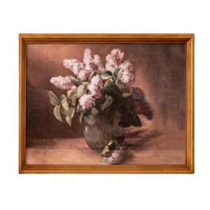 This beautiful still life botanical features a vase of lilacs. It has an antiqued gold frame that will look great by itself or mixed in with other wall art!

11" H x 15" W