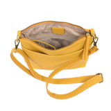 Your perfect goes with anything bag! In just the right size to carry your essentials, this sunflower yellow pebbled vegan leather bag has multiple pockets and a top zip closure for security, so you are ready for anything your day brings. Add one of our interchangeable Guitar Straps to add your own style!


Product Details
Dimensions: 11 in. W x 11.25 in. H x 3.5 in. D
Magnetic Snap Closure
2 Open and 1 Zipper Interior Pockets
2 Exterior Open Pockets and 1 Back Zipper Pocket
12x18 in. Drop Adjustable and Det
