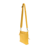 Your perfect goes with anything bag! In just the right size to carry your essentials, this sunflower yellow pebbled vegan leather bag has multiple pockets and a top zip closure for security, so you are ready for anything your day brings. Add one of our interchangeable Guitar Straps to add your own style!


Product Details
Dimensions: 11 in. W x 11.25 in. H x 3.5 in. D
Magnetic Snap Closure
2 Open and 1 Zipper Interior Pockets
2 Exterior Open Pockets and 1 Back Zipper Pocket
12x18 in. Drop Adjustable and Det