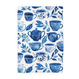 These towels are perfect home and kitchen decor, and also makes a great hostess gift for your next tea party! Blue teacups, teapots and botanical leaves are scattered all over this beautiful white towel.

Measures approximately 16”x 24”

Made of 80% Polyester and 20% Polyamide.

Design is permanently printed - Single side across whole towel

It is called a waffle weave because the towel has raised looped edges on the surface of the towel in the shape like that on a delicious Belgian Waffle. These “pockets''