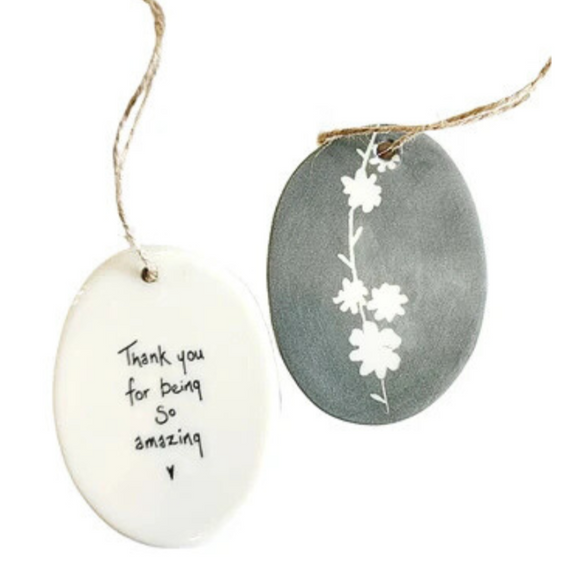 We love our porcelain ornaments because they are perfect for gift-giving! This oval ornament says, 