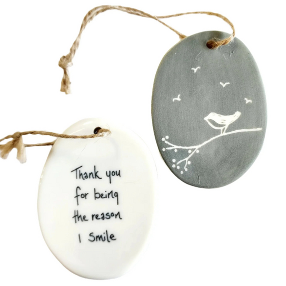 We love our porcelain ornaments because they are perfect for gift-giving! This oval ornament says, 