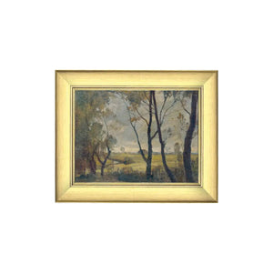 We just love this moody painting of "The Woods." The view is from inside the woods looking out at the farm in the distance. Printed on premium canvas fabric for a lasting, textured finish and has a handcrafted ornate bronze/gold frame that adds a classic charm.&nbsp; Comes with a paper backing and hanging hardware for easy installation.

Made in the USA: Proudly crafted with quality and care.&nbsp;

Care Instructions: Keep canvas dry to maintain its quality. If smudged or dirty, gently wipe with a dry, soft