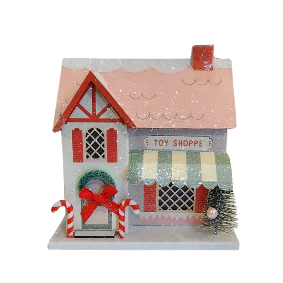 Get in the holiday spirit with a charming Christmas village addition! This toy shop house with light will brighten up your decor, adding a touch of whimsy to your home. Perfect for collectors or anyone looking to add some festive fun to their space.

House is 4