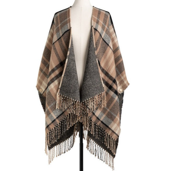 Whether snuggling up or going out, our soft acrylic Reversible Plaid Kimono is a closet must-have. Beautiful in Camel & Black, we love that it gives us two looks in one, but we also love the side buttons that make armholes and keep your kimono around your shoulders! Unbutton them to use as a big blanket scarf! So many possibilities!