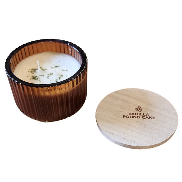 You'll love our new cathedral bowl candle style and size! This vanilla pound cake candle has been poured into a pretty brown-patterned glass and comes with a wooden lid.

One of our year-round best sellers, a pure pound cake, with rich vanilla, and a soft baked tone will have you running to the oven!

Filled with 6.5 oz. of American Soybean WaxTM. Measures 4.25