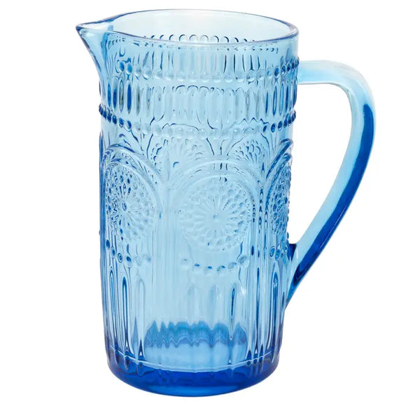 This pretty blue glass pitcher is a nod to times gone by! It's a beautifully crafted pitcher with an intricate raised pattern that adds a touch of sophistication to any table setting. 

7