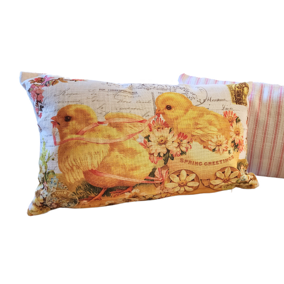 This adorable vintage postcard pillow has one chick pulling another chick in an egg card with plenty of pretty florals. The reverse has a pink and white stripe fabric on it.

 9