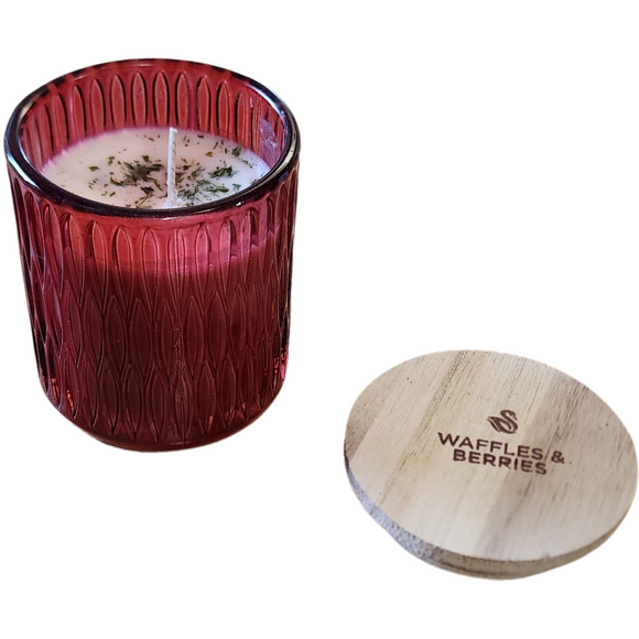 You'll love our newest cathedral glass tumbler! This waffles & berries candle has been poured into a pretty red patterned glass and comes with a wooden lid.

The fragrance combines warm, sweet notes of freshly made waffles with juicy, ripe berries for a mouth-watering experience.

Filled with 6.5 oz. of American Soybean WaxTM. Measures 3.25
