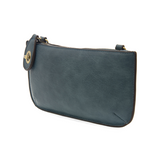 Our most popular bag, this mini clutch, with its sleek silhouette, is as gorgeous as it is versatile.&nbsp; Features include a polished turn lock, six card slots, and an interior zipper for change.&nbsp; It can be styled in many ways, with removable straps to alternate between wallet, crossbody, and wristlet!  &nbsp;5"H x 9.5"W x 1"D